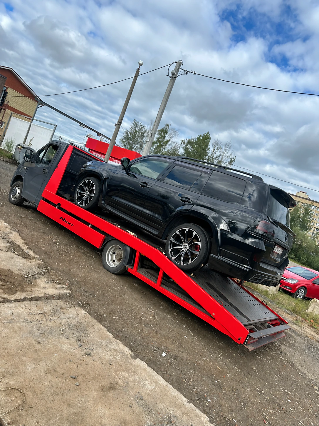 Toyota Land Cruiser на платформе эвакуатора БустАвто